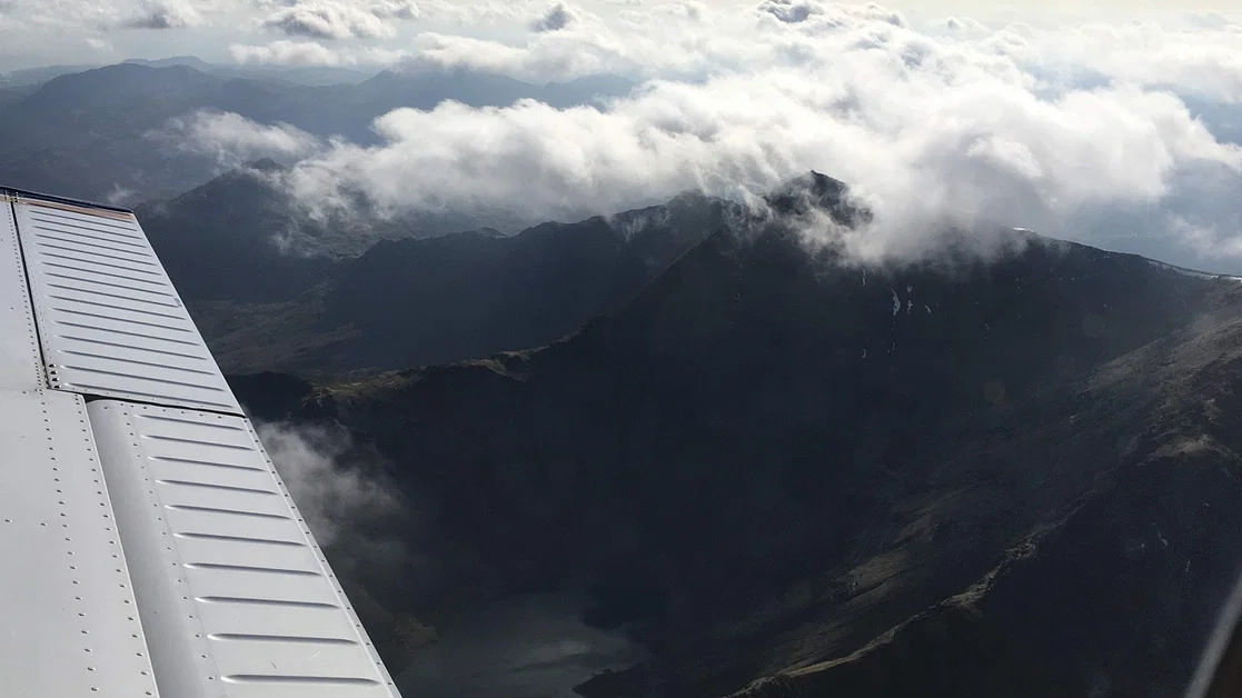 Fly to Caernarfon with short walk to beach or lunch in cafe