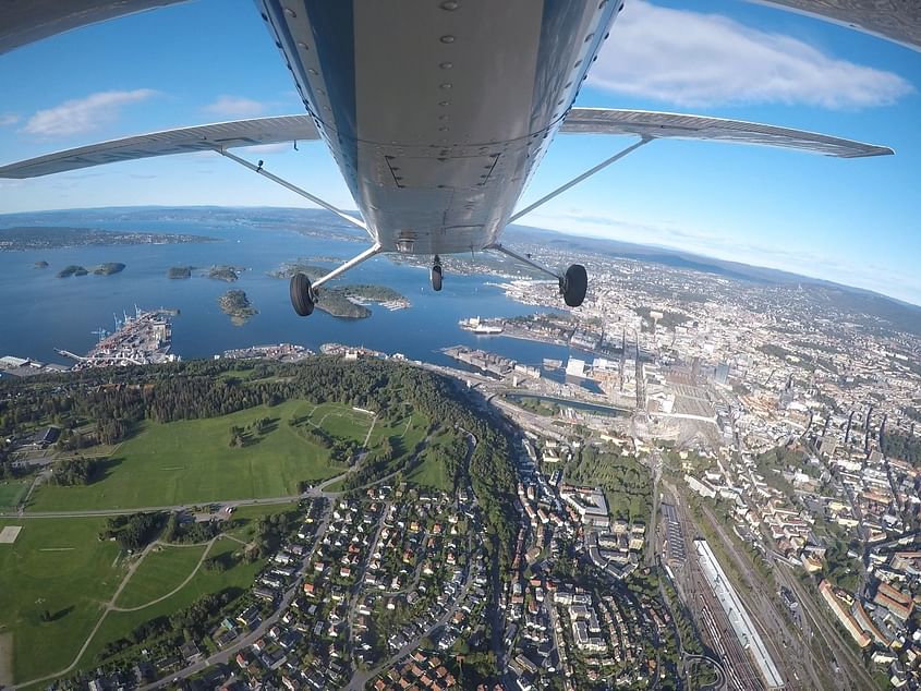 Sightseeing over Oslo in a "Cub"