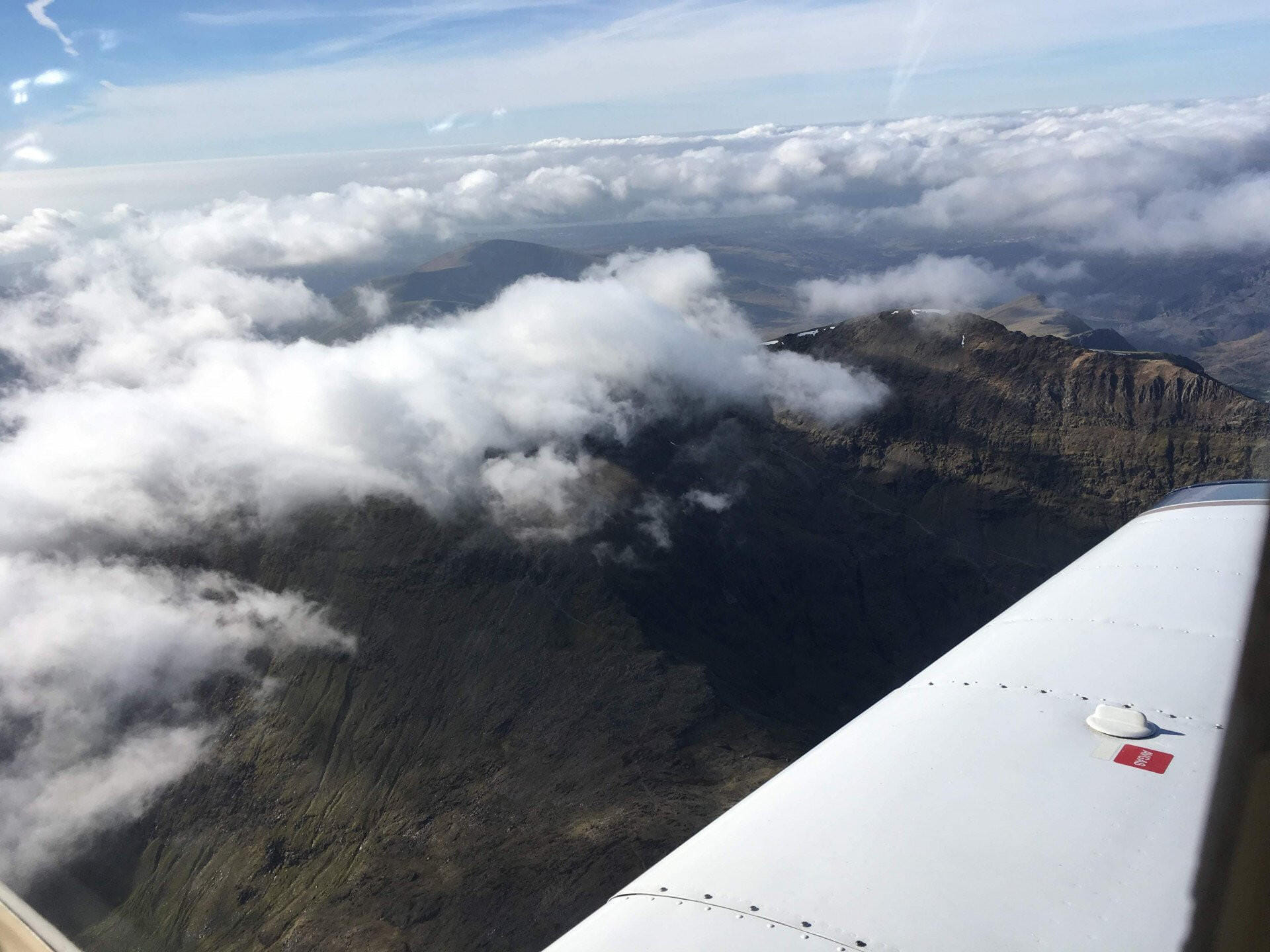 Fly to Caernarfon with short walk to beach or lunch in café