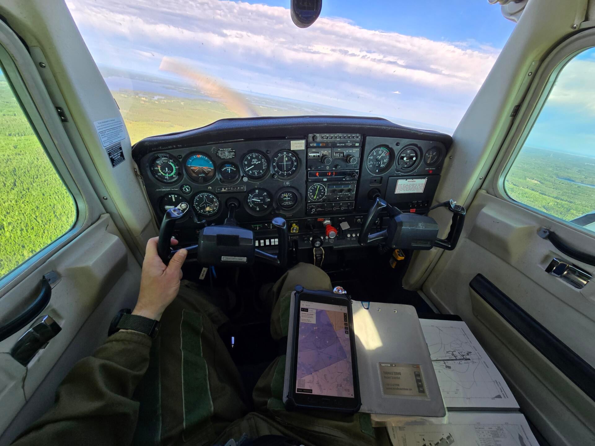 Cessna 152 cockpit view from a solo flight.