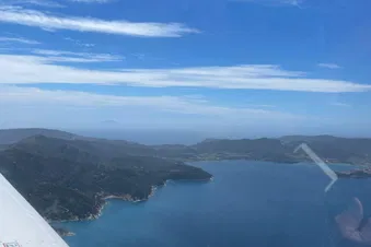 Overfly Isola d'Elba and the surrounding isles