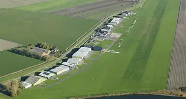 Peaceful flight to a Dutch grass airfield