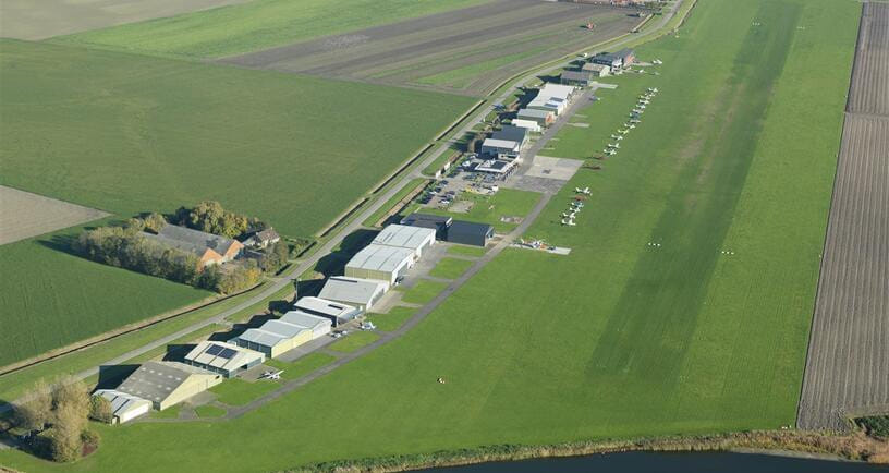 Peaceful flight to a Dutch grass airfield