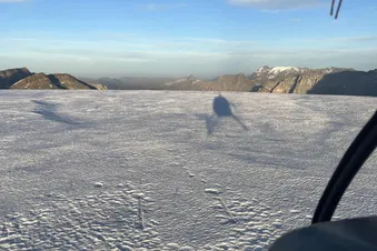 Helicopter Landing on a glacier at 10'000feet - 3000m