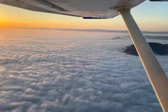 Le coucher de soleil vu du ciel, Préalpes et Plateau suisse