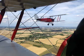 Delve into the past on a 30 Minute Vintage Biplane Flight