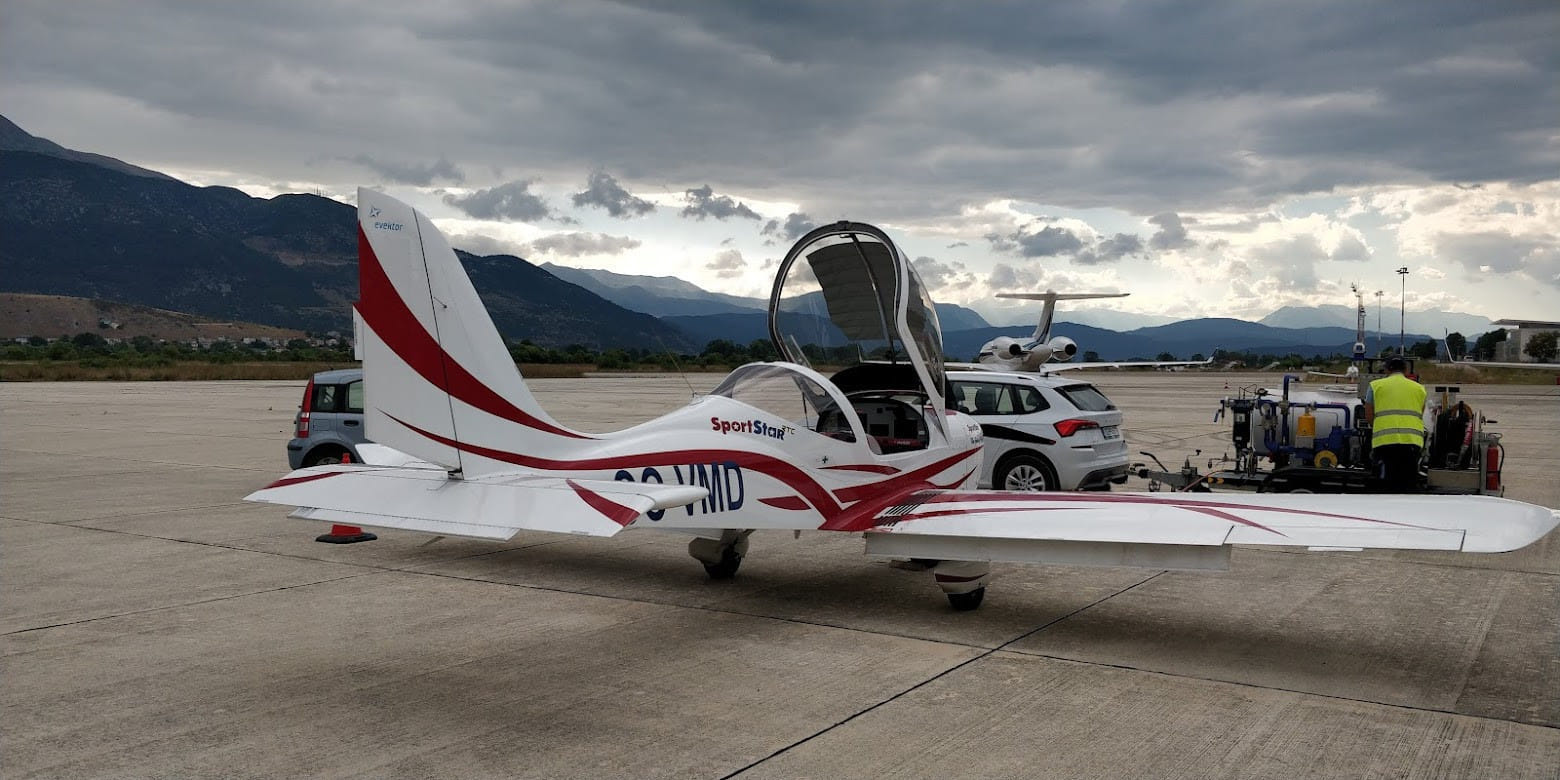 Fueling the aircraft in Greece between the business jets