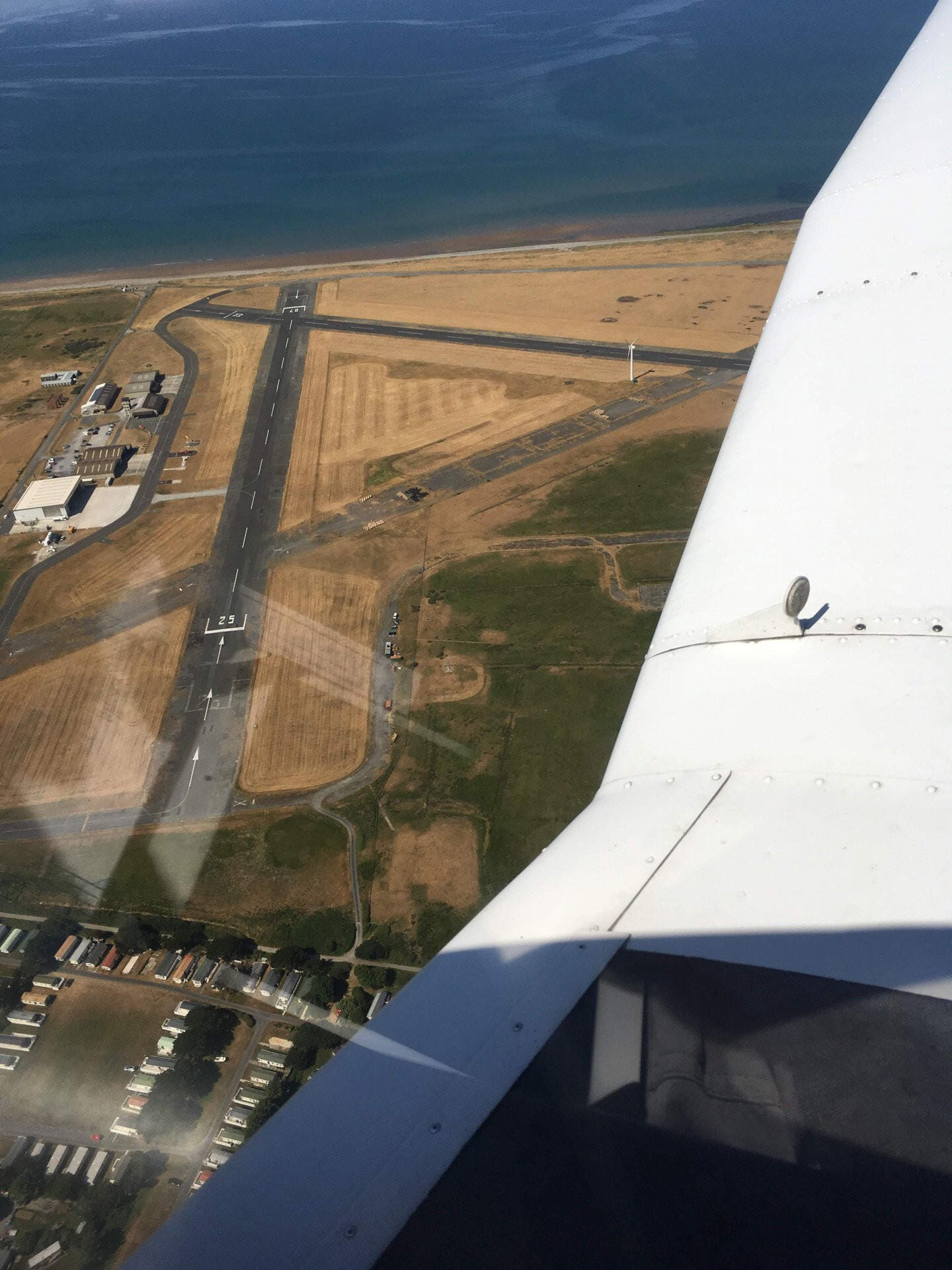 Fly to Caernarfon with short walk to beach or lunch in café