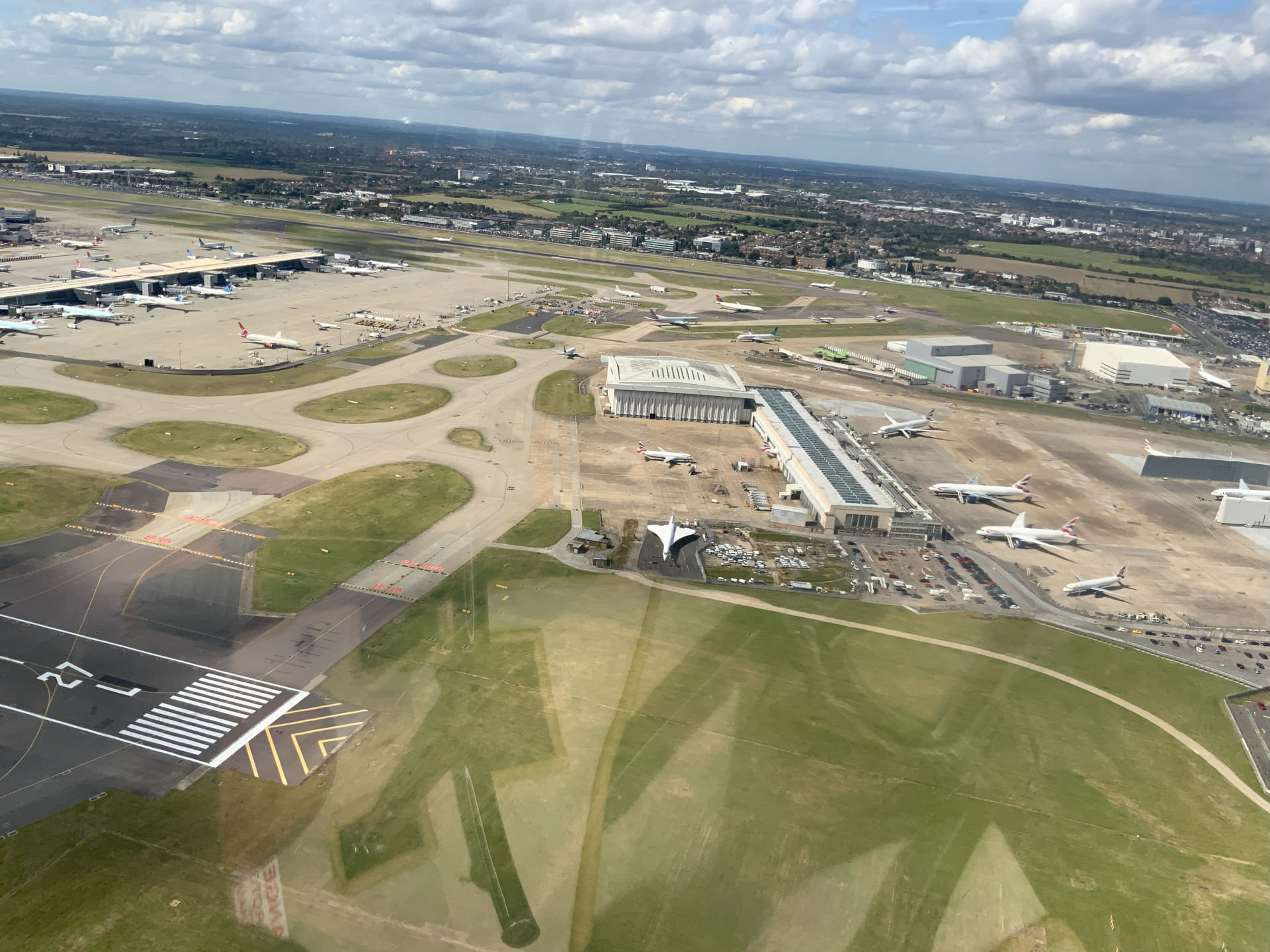 Crossing the threshold of Runway 27L at Heathrow