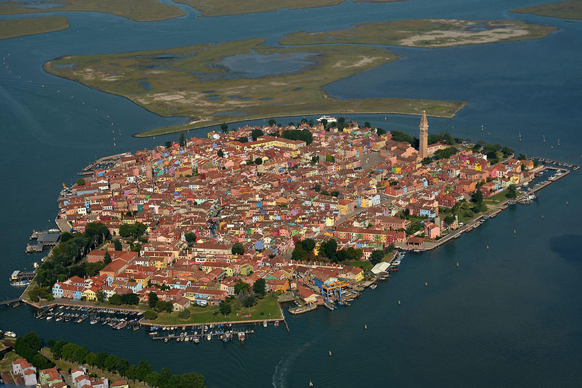 Venice and the treasures of its lagoon on a twin engine.