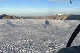 Helicopter Landing on a glacier at 10'000feet - 3000m