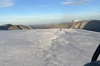 Helicopter Landing on a glacier at 10'000feet - 3000m
