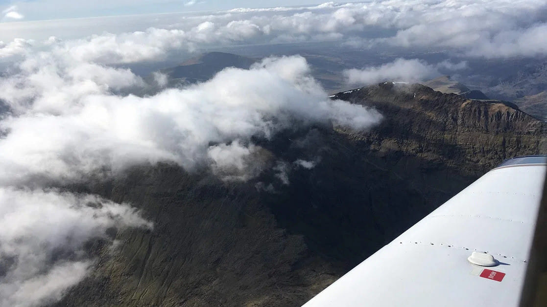 Fly to Caernarfon with short walk to beach or lunch in cafe