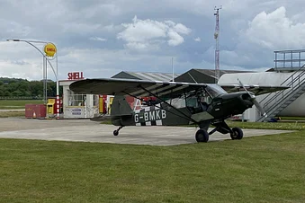Aviation fuel & Piper cub at goodwood