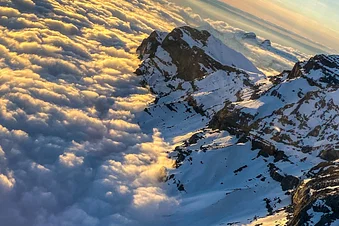 Le coucher de soleil vu du ciel, Préalpes et Plateau suisse