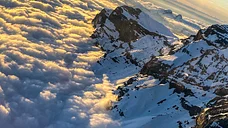 Le coucher de soleil vu du ciel, Préalpes et Plateau suisse