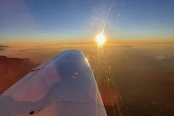 Romantischer Sonnenuntergangsflug über Basel