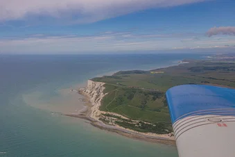 Flying over the White Cliffs, take off from Woking, Fairoaks