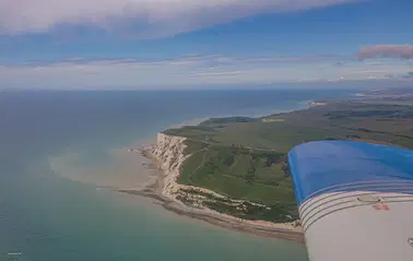 Flying over the White Cliffs, take off from Woking, Fairoaks