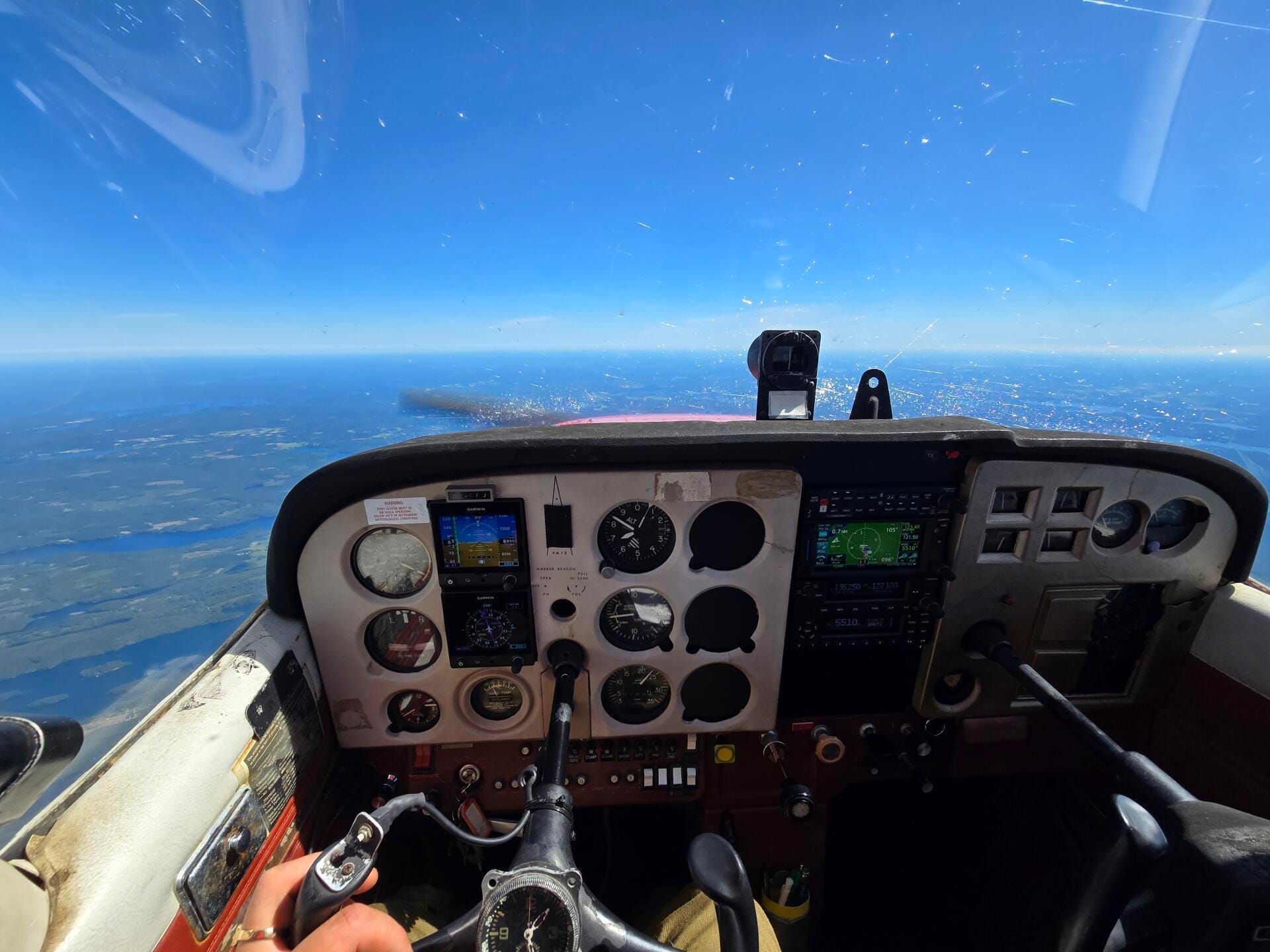 Cessna 172 cockpit view from a solo flight.
