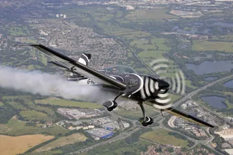Extra 330 aerobatics flight 30 mins plus brief, near London.