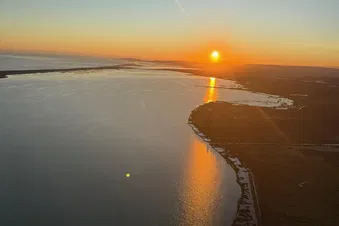 Coucher du soleil a bord d’un hélicoptère