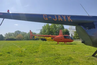 Local land away to speech house by helicopter