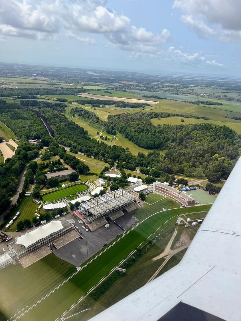 Fly from Denhm to Goodwood and return