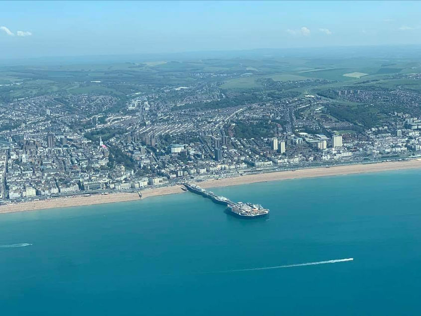 Flight over Brighton pier and coast