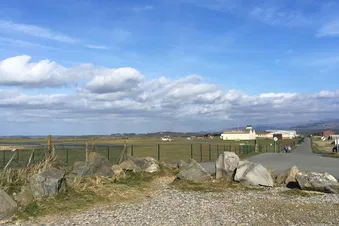 Fly to Caernarfon with short walk to beach or lunch in café