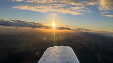 Vol crépusculaire et couché de soleil à 3000 pieds