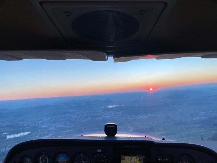 Sun sets behind the distant Jura