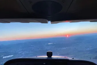 Sun sets behind the distant Jura