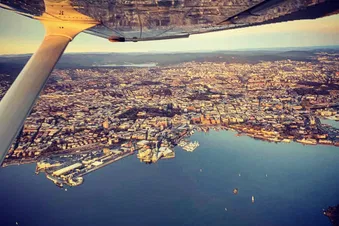 Flying over Oslo in Norway, take off from Kjeller