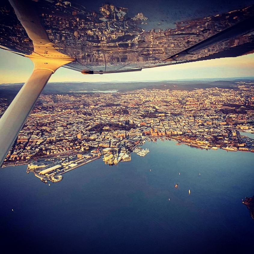 Flying over Oslo in Norway, take off from Kjeller