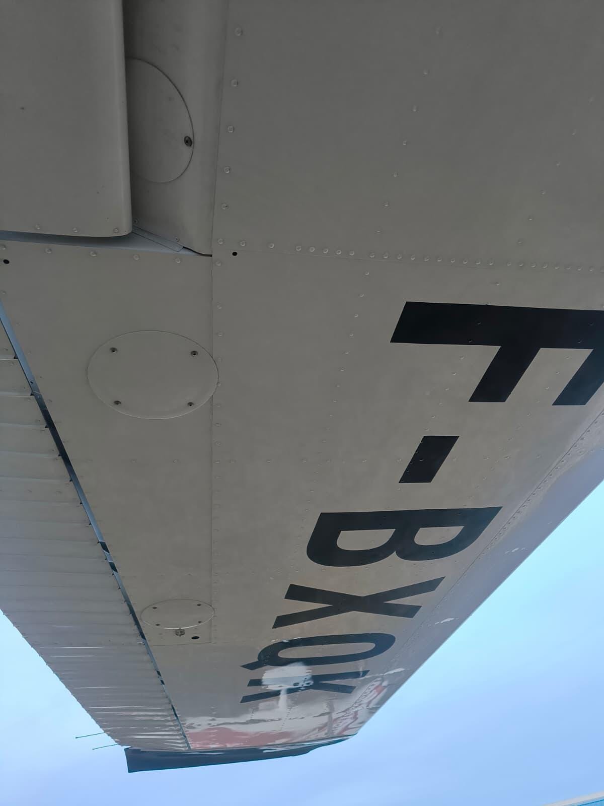 Vue sous l'aile du F-BXQK