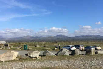 Fly to Caernarfon with short walk to beach or lunch in café