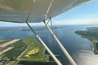 Discover Zeeland in a vintage aircraft.