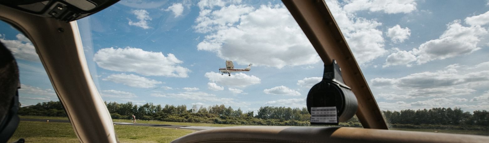 Plane flies in fine weather